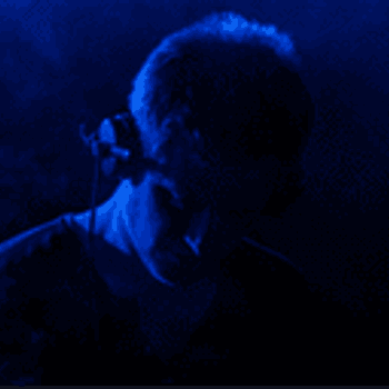 DJ in dark club